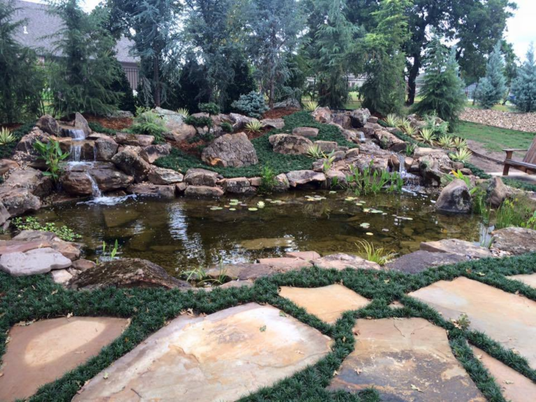 Professional evaluating pond site conditions with specialized tools in Lexington, OK